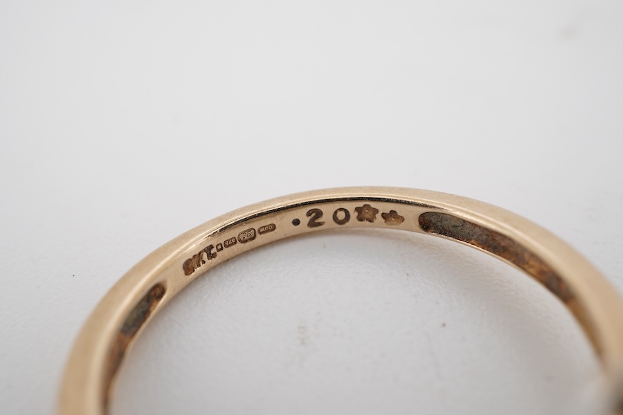A 9ct gold and five stone oval cut sapphire set half hoop ring, with a diamond chip set border, size N, gross weight 3.9 grams.